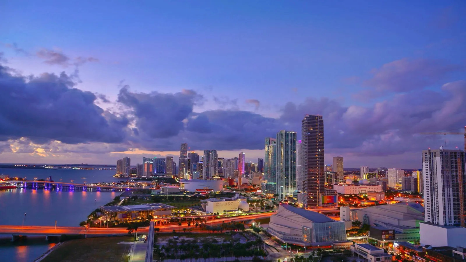 Penthouses in Miami for sale — Miami skyline at dusk from a high floor